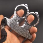 Metal two-finger fist buckle